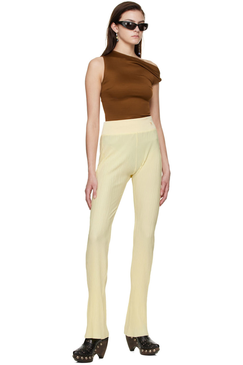Stretch viscose and nylon-blend jersey T-shirt. Asymmetric construction.

· Modified boatneck
· Twisted detailing at sleeve
· Concealed zip closure at side-seam

Supplier color: Chestnut