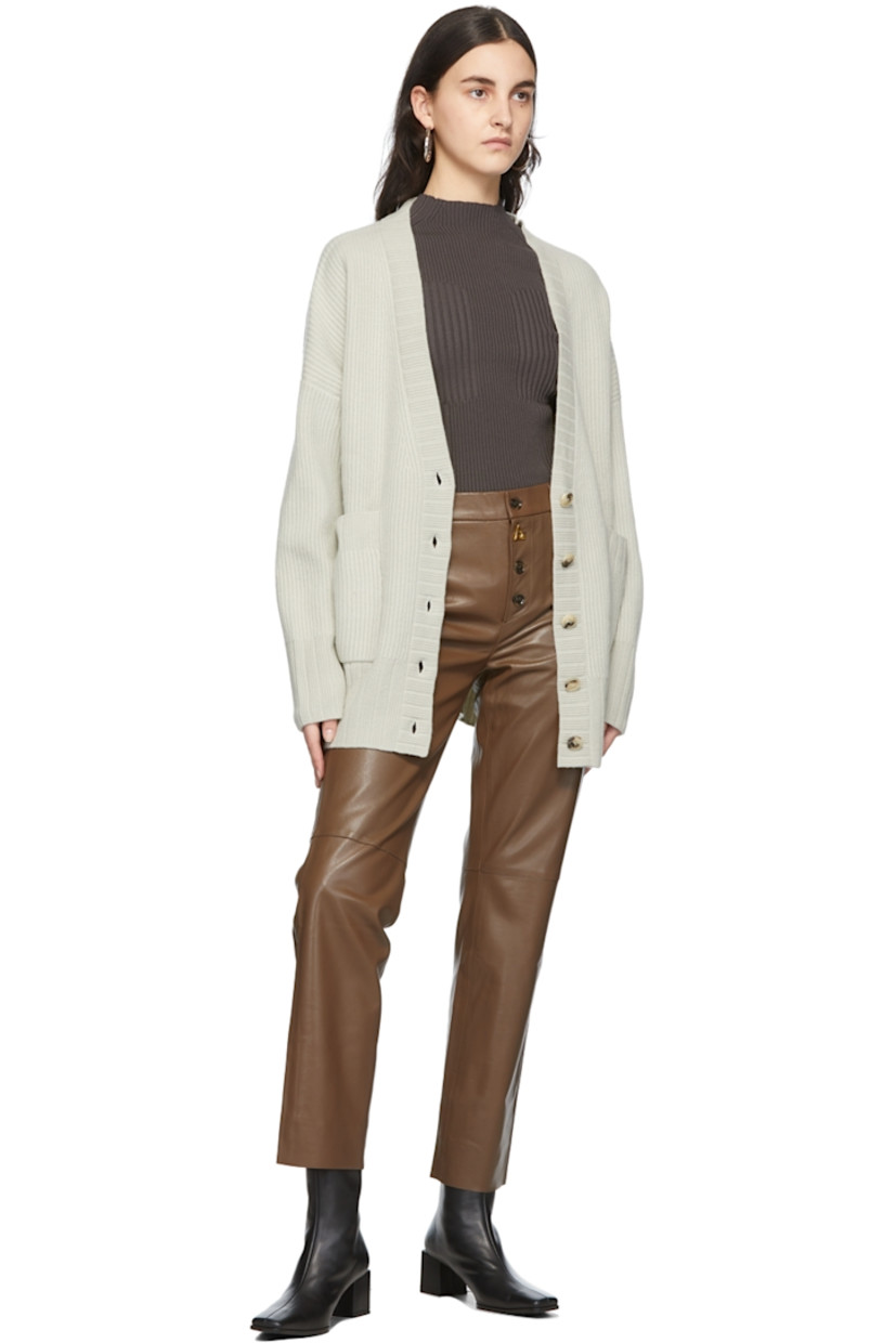 Straight-leg lambskin trousers in taupe. 

· High-rise
· Two-pocket styling
· Button-fly featuring signature logo hardware
· Fully lined
· Gold-tone hardware

Supplier color: Taupe