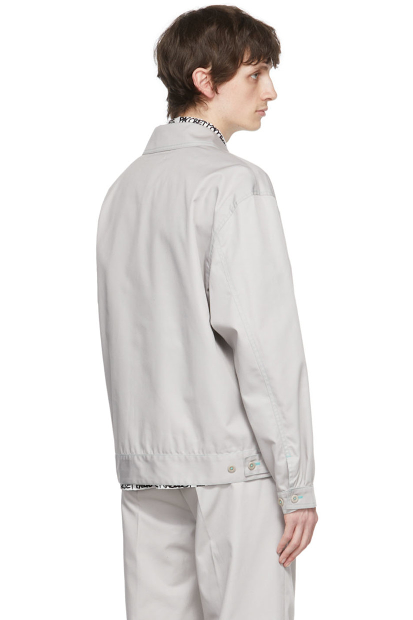 Polyester and cotton-blend twill jacket. Contrast stitching throughout.

· Spread collar
· Zip closure
· Logo graphic embroidered at chest
· Welt pockets
· Two-button barrel cuffs
· Adjustable buttoned tabs at hem

Supplier color: Grey