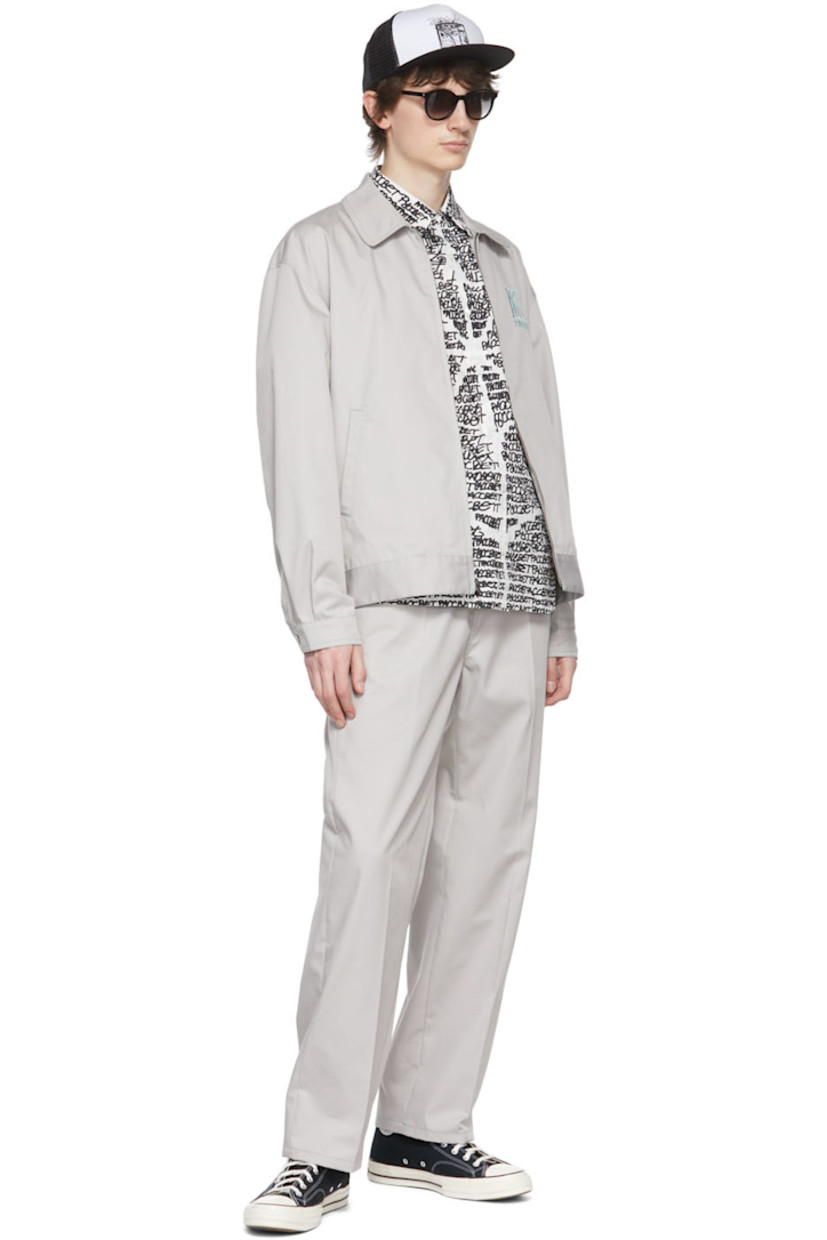 Polyester and cotton-blend twill jacket. Contrast stitching throughout.

· Spread collar
· Zip closure
· Logo graphic embroidered at chest
· Welt pockets
· Two-button barrel cuffs
· Adjustable buttoned tabs at hem

Supplier color: Grey