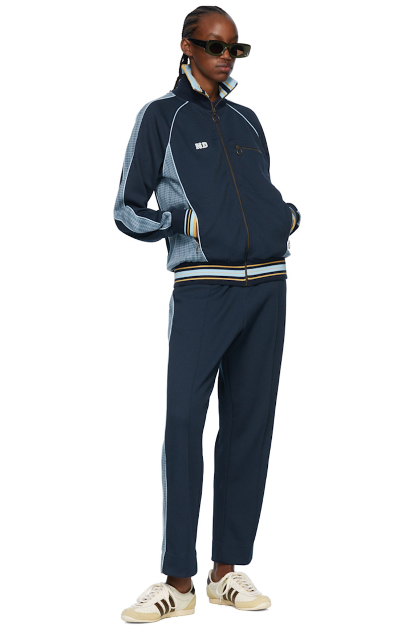 Cotton-blend jersey lounge pants.

· Drawstring at elasticized waistband
· Piping at front 
· Knit trim at sides
· Logo embroidered at back pocket
· Three-pocket styling

Supplier color: Navy