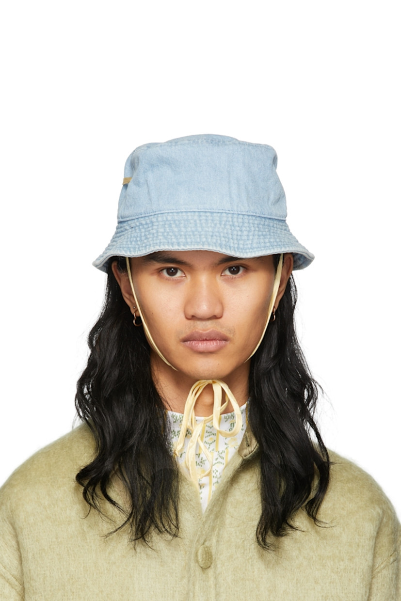 Non-stretch denim bucket hat in blue. 

· Quilted brim 
· Eyelets at crown
· Silk self-tie chin strap 

Supplier color: Vintage wash