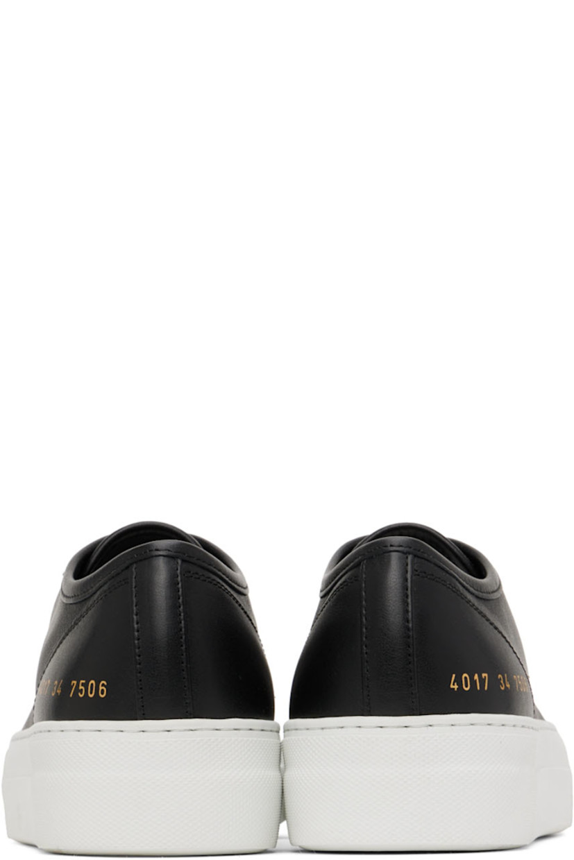Low-top buffed leather sneakers in black.

· Lace-up closure
· Buffed leather and suede lining
· Signature series number stamp in gold-tone at outer side
· Rubber platform midsole
· Treaded rubber outsole
· Platform: H1.25 in

Supplier color: Black