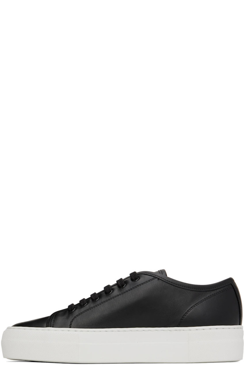 Low-top buffed leather sneakers in black.

· Lace-up closure
· Buffed leather and suede lining
· Signature series number stamp in gold-tone at outer side
· Rubber platform midsole
· Treaded rubber outsole
· Platform: H1.25 in

Supplier color: Black