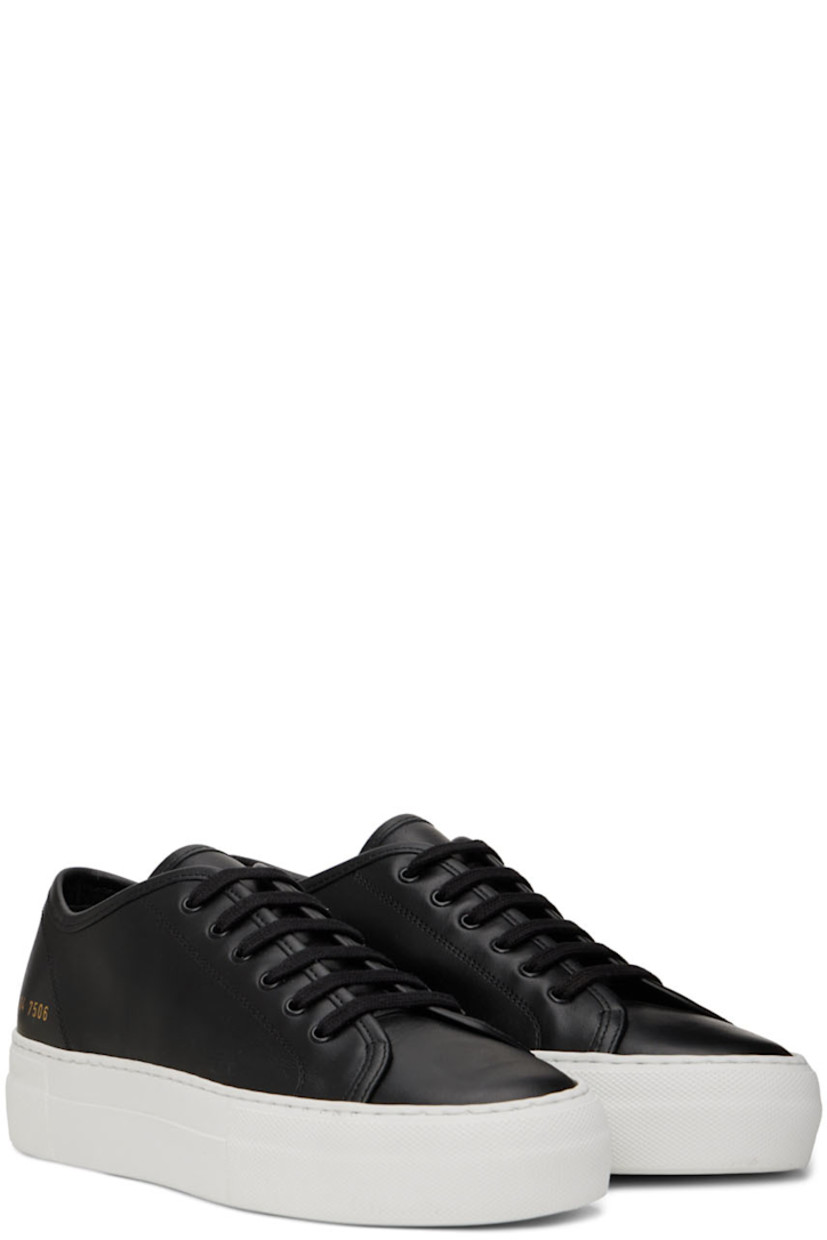 Low-top buffed leather sneakers in black.

· Lace-up closure
· Buffed leather and suede lining
· Signature series number stamp in gold-tone at outer side
· Rubber platform midsole
· Treaded rubber outsole
· Platform: H1.25 in

Supplier color: Black