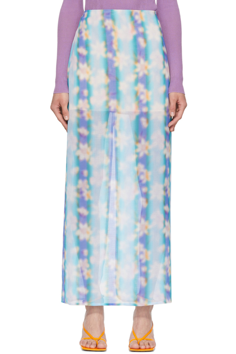 Semi-sheer polyester crepon skirt.

· Zip closure at back
· Central vent at back hem
· Partial satin lining

Supplier color: Lilac