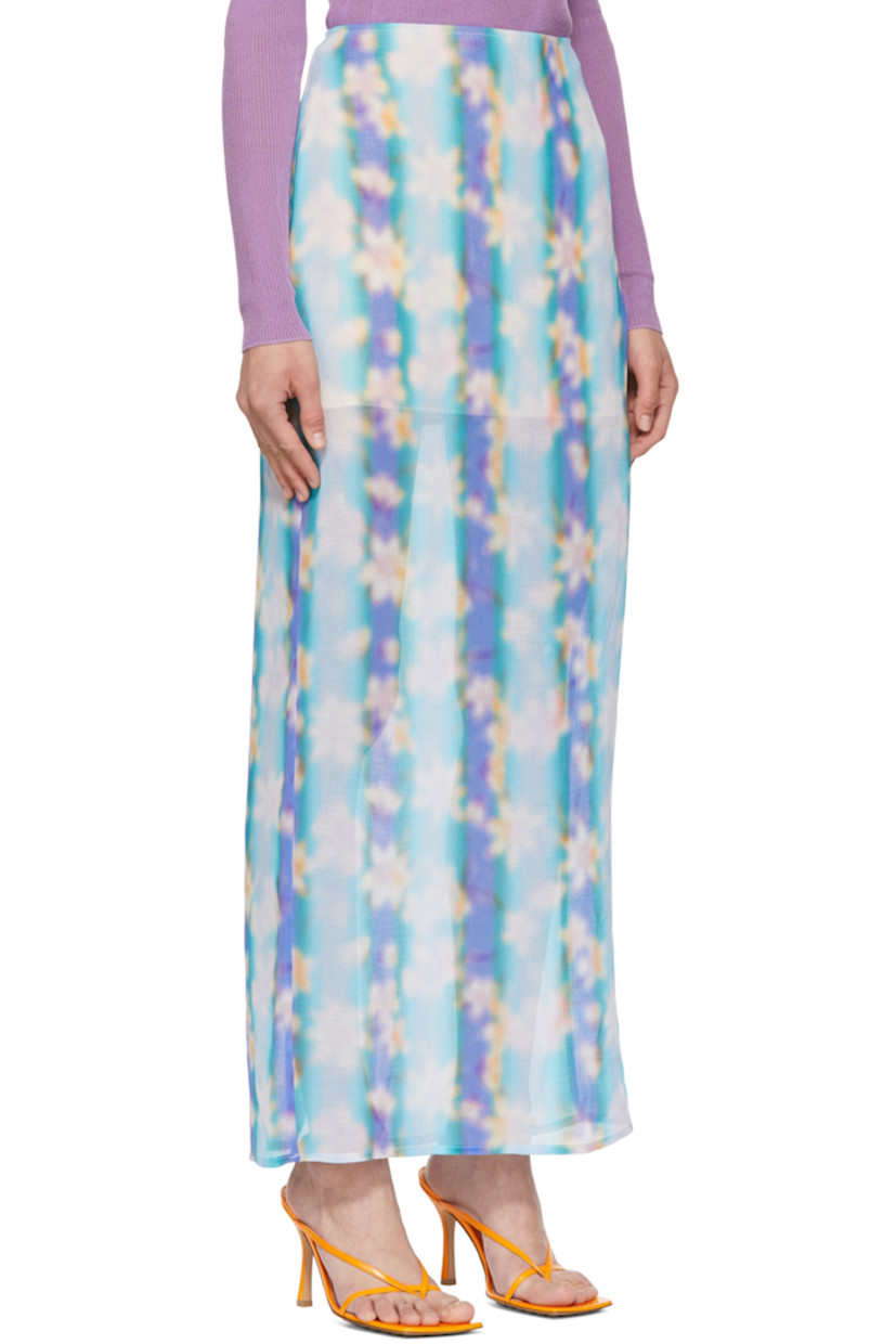 Semi-sheer polyester crepon skirt.

· Zip closure at back
· Central vent at back hem
· Partial satin lining

Supplier color: Lilac