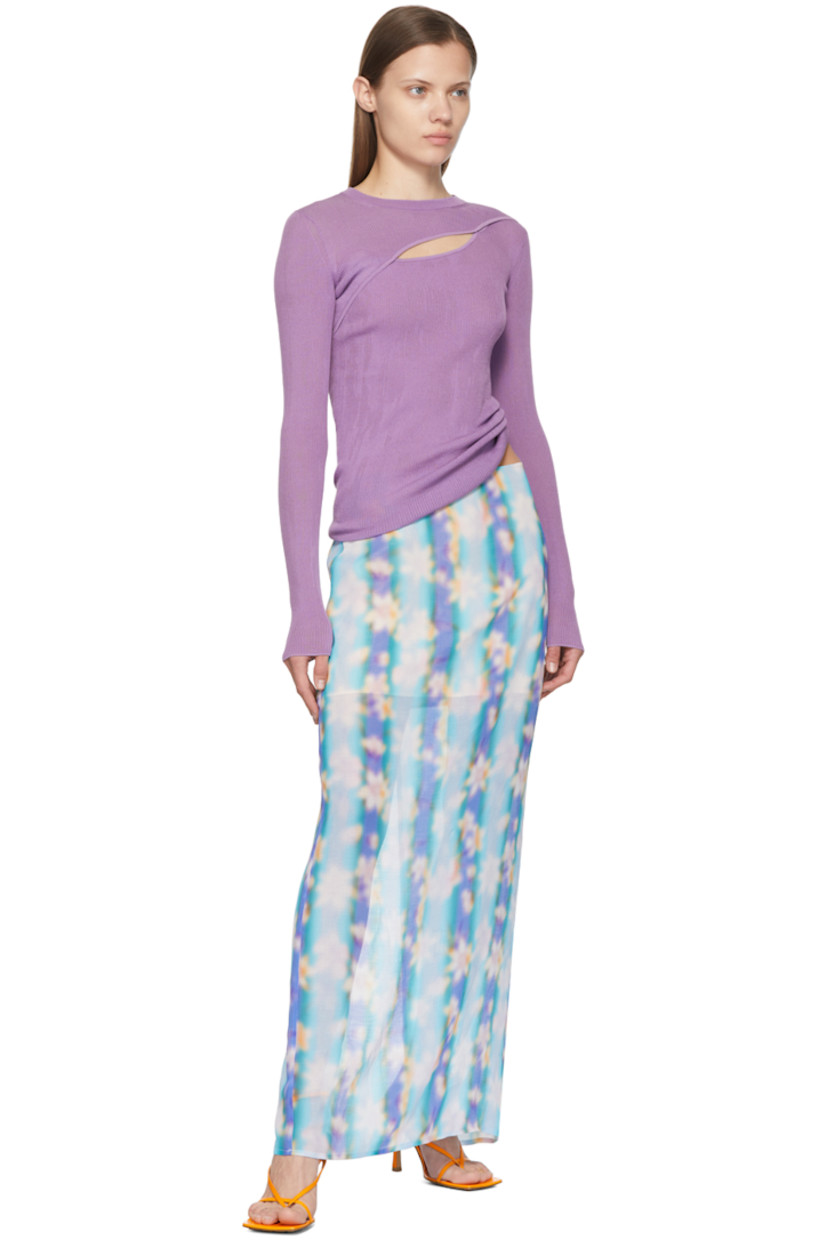 Semi-sheer polyester crepon skirt.

· Zip closure at back
· Central vent at back hem
· Partial satin lining

Supplier color: Lilac