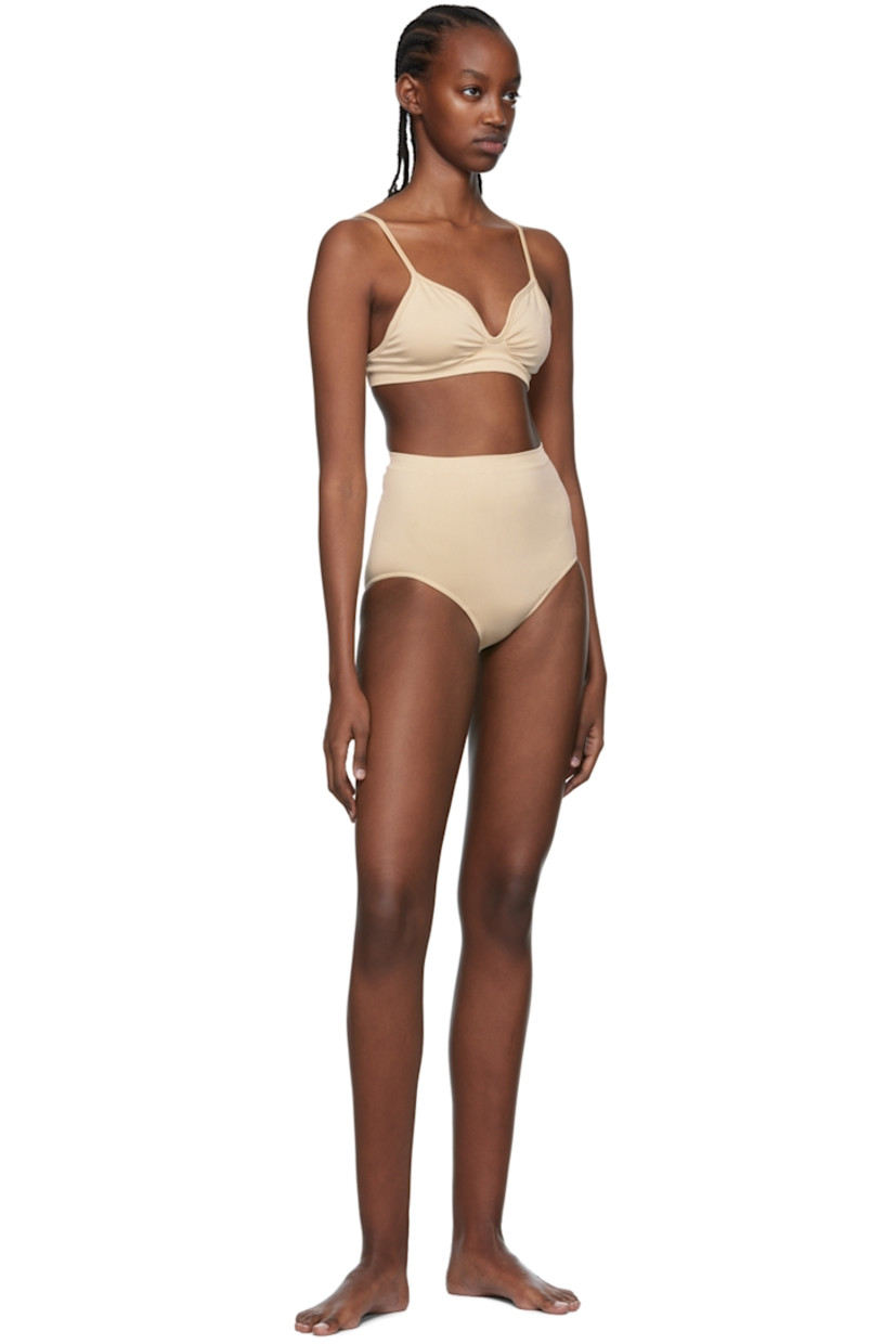 Stretch nylon jersey briefs. 

· High-rise
· Moisture-wicking, chlorine-resistant, quick-drying

Supplier color: Sand

Size 1 is equivalent to US 2-12
Size 2 is equivalent to US 14-20