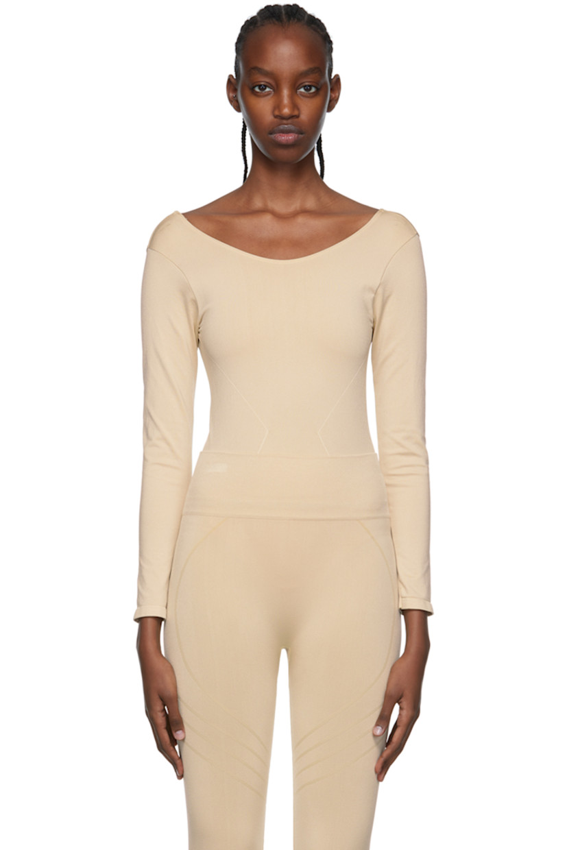 Stretch nylon jersey bodysuit. Moisture-wicking, chlorine-resistant, quick-drying.

· Scoop neck
· Low back

Supplier color: Sand

Size 1 is equivalent to US 2-12
Size 2 is equivalent to US 14-20
