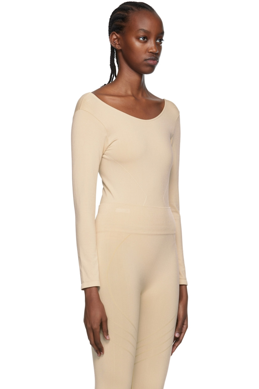 Stretch nylon jersey bodysuit. Moisture-wicking, chlorine-resistant, quick-drying.

· Scoop neck
· Low back

Supplier color: Sand

Size 1 is equivalent to US 2-12
Size 2 is equivalent to US 14-20