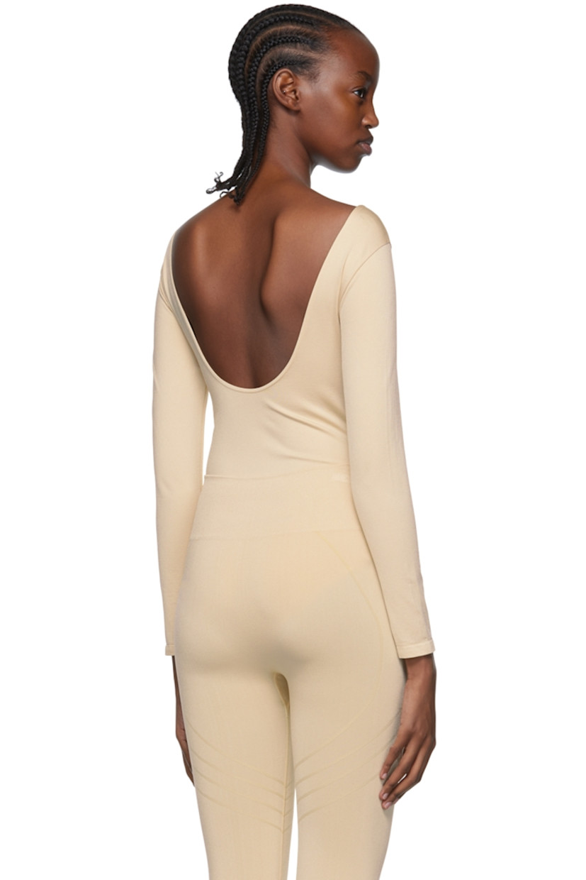 Stretch nylon jersey bodysuit. Moisture-wicking, chlorine-resistant, quick-drying.

· Scoop neck
· Low back

Supplier color: Sand

Size 1 is equivalent to US 2-12
Size 2 is equivalent to US 14-20