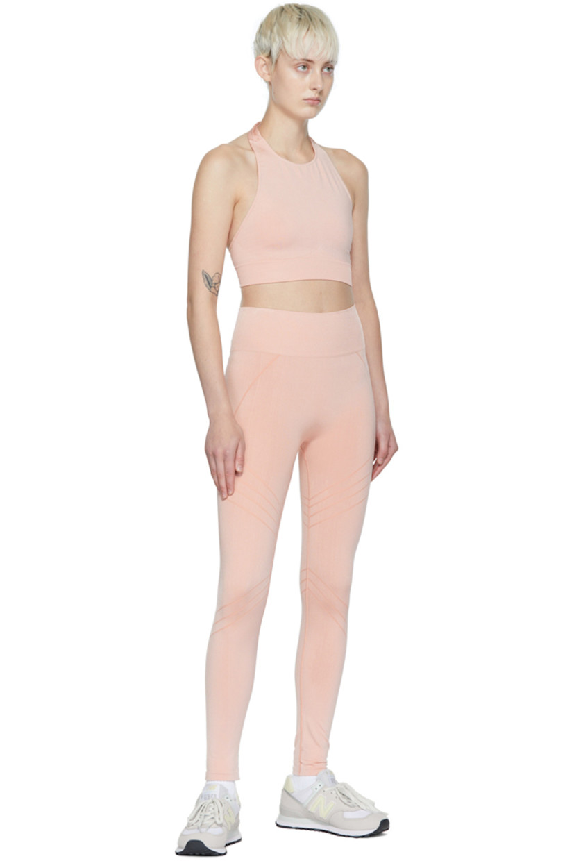 Stretch polyamide jersey tank top. Moisture-wicking, chlorine-resistant, and quick-drying.

· Self-tie halter strap
· Rib knit hem

Supplier color: Rose

Size 1 is equivalent to US 2-12
Size 2 is equivalent to US 14-20