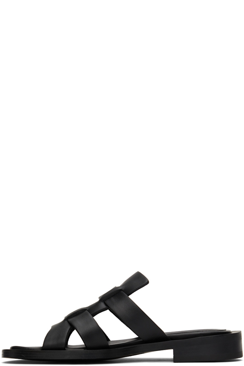 Buffed leather flat sandals in black.

· Open round toe
· Logo embossed at leather footbed
· Stacked leather heel
· Rubber outsole

Supplier color: Black
