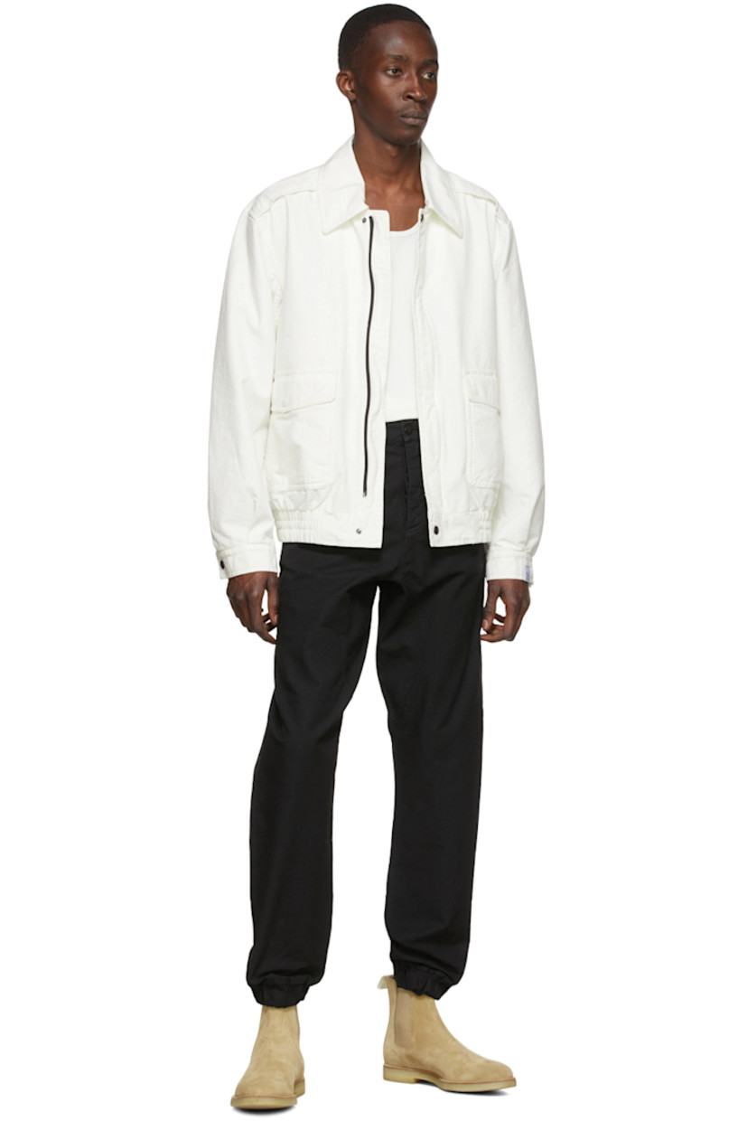 Cotton canvas trousers. 

· Belt loops
· Button-fly 
· Four-pocket styling 
· Elasticized cuffs

Supplier color: Black