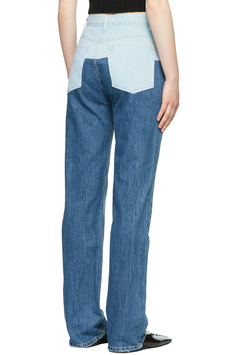 Non-stretch denim jeans. Fading and whiskering throughout.

· Belt loops
· Colorblocked panel at waistband
· Zip-fly
· Five-pocket styling

Supplier color: Blue