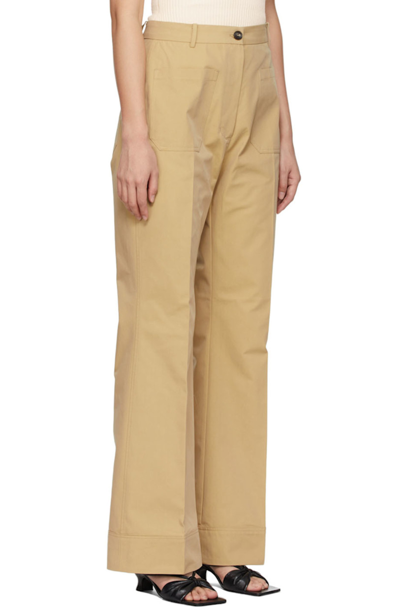 Flared cotton-blend twill trousers in beige. 

· High-rise 
· Four-pocket styling
· Central creases at front and back
· Zip-fly

Supplier color: Beige