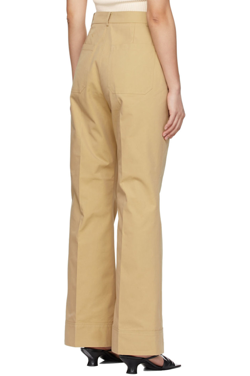 Flared cotton-blend twill trousers in beige. 

· High-rise 
· Four-pocket styling
· Central creases at front and back
· Zip-fly

Supplier color: Beige