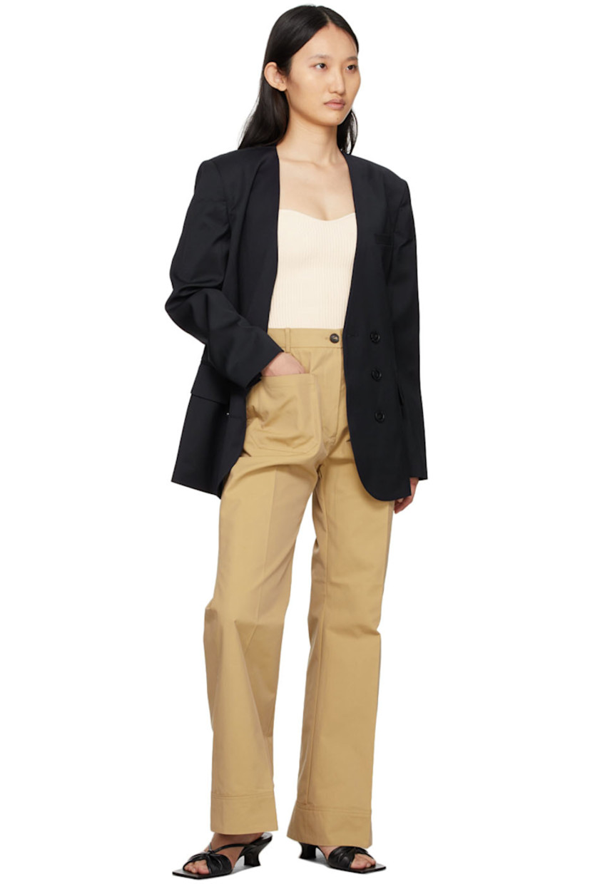 Flared cotton-blend twill trousers in beige. 

· High-rise 
· Four-pocket styling
· Central creases at front and back
· Zip-fly

Supplier color: Beige