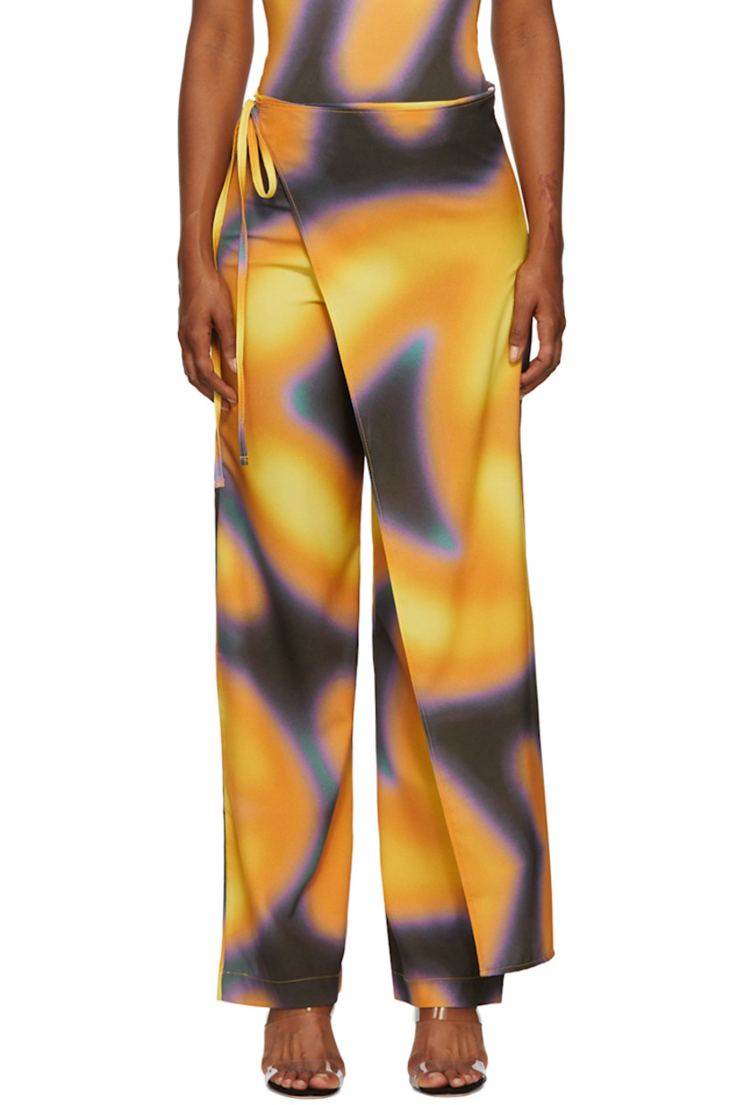 Stretch polyester crepe lounge pants. Graphic pattern printed throughout.

· Wrap construction
· Darts and self-tie fastening waistband
· Zip closure at outseam

Wholesale exclusivity at SSENSE.

Supplier color: Tormenta