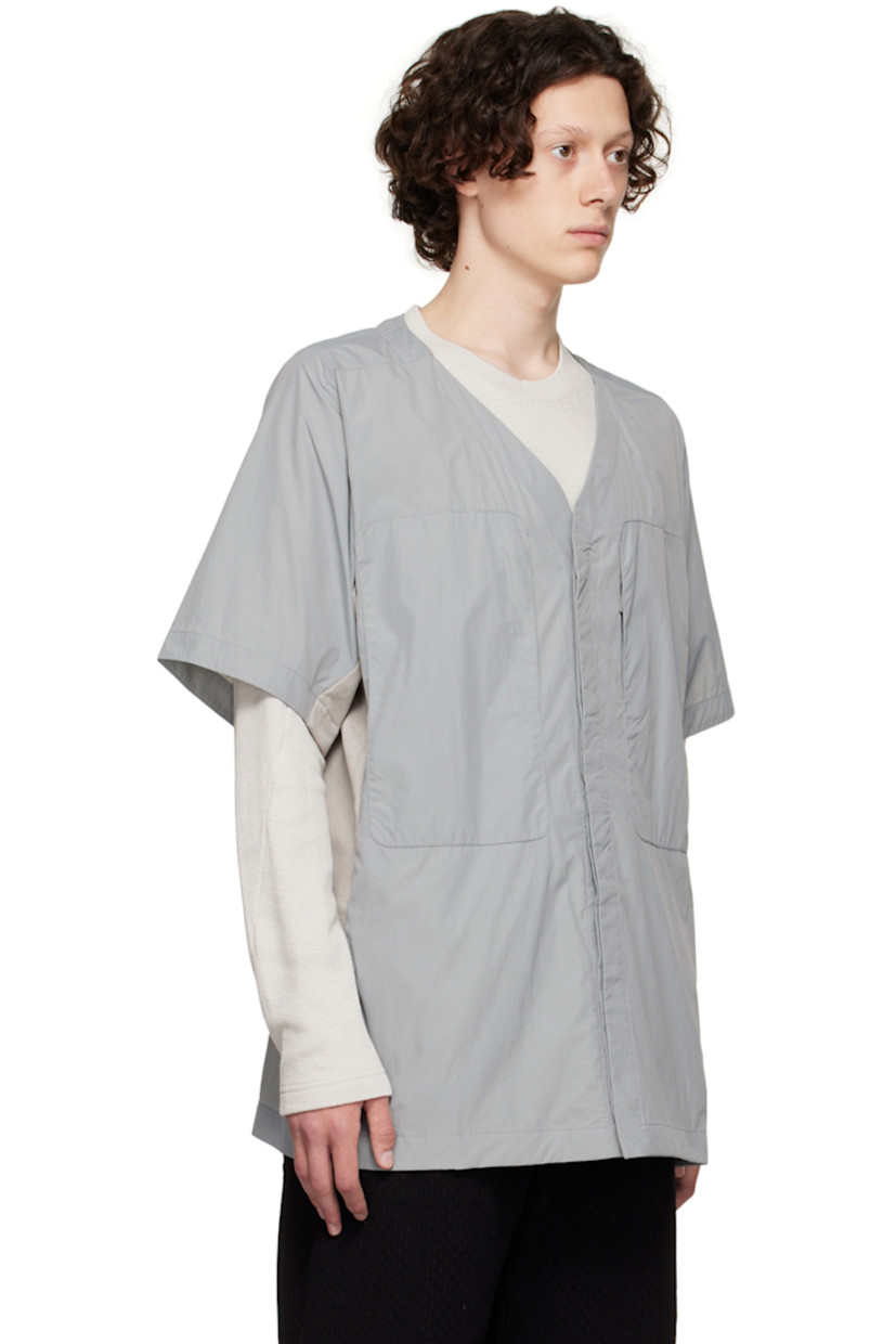 Paneled nylon taffeta and 8-Bit™ knit organic cotton shirt. 

· Y-neck
· Concealed press-stud closure
· Concealed self-tie straps at waist
· Zip pockets
· Seam pockets
· Vent at armscyes
· Patch pockets at interior

Supplier color: Grey multicolour