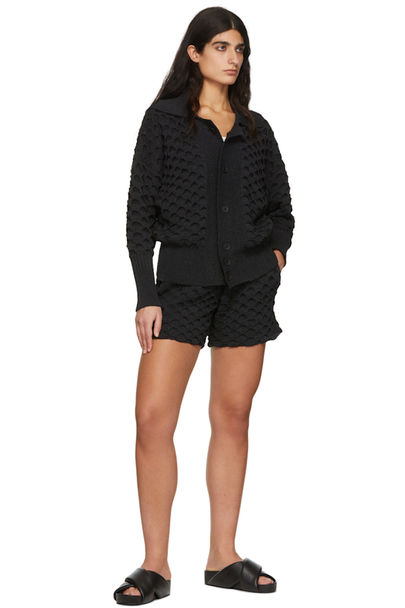 Knit recycled polyester and paper-blend shorts. Distressing throughout.

· Concealed drawstring at waistband
· Two-pocket styling

Supplier color: Black