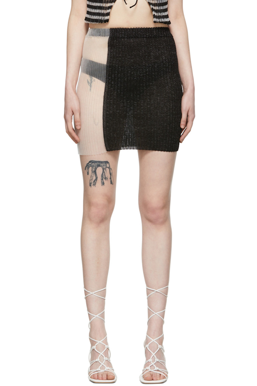 Paneled rib knit nylon and nylon mesh skirt. Elasticized waistband.

Supplier color: Black/Transparent