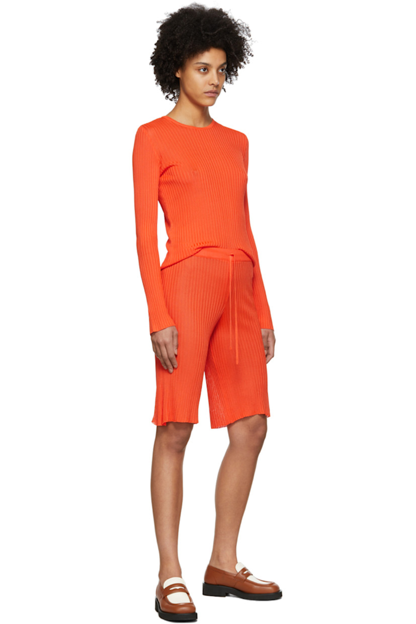 Rib knit viscose shorts. 

· Drawstring at elasticized waistband 
· Fraying at cuffs 

Available exclusively at SSENSE. 

Supplier color: Orange