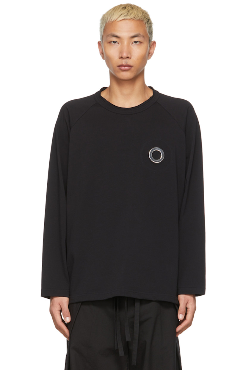 Long sleeve cotton jersey T-shirt in black featuring eyelets in silver-tone at chest. Raw edge at crewneck collar. 

Supplier color: Black