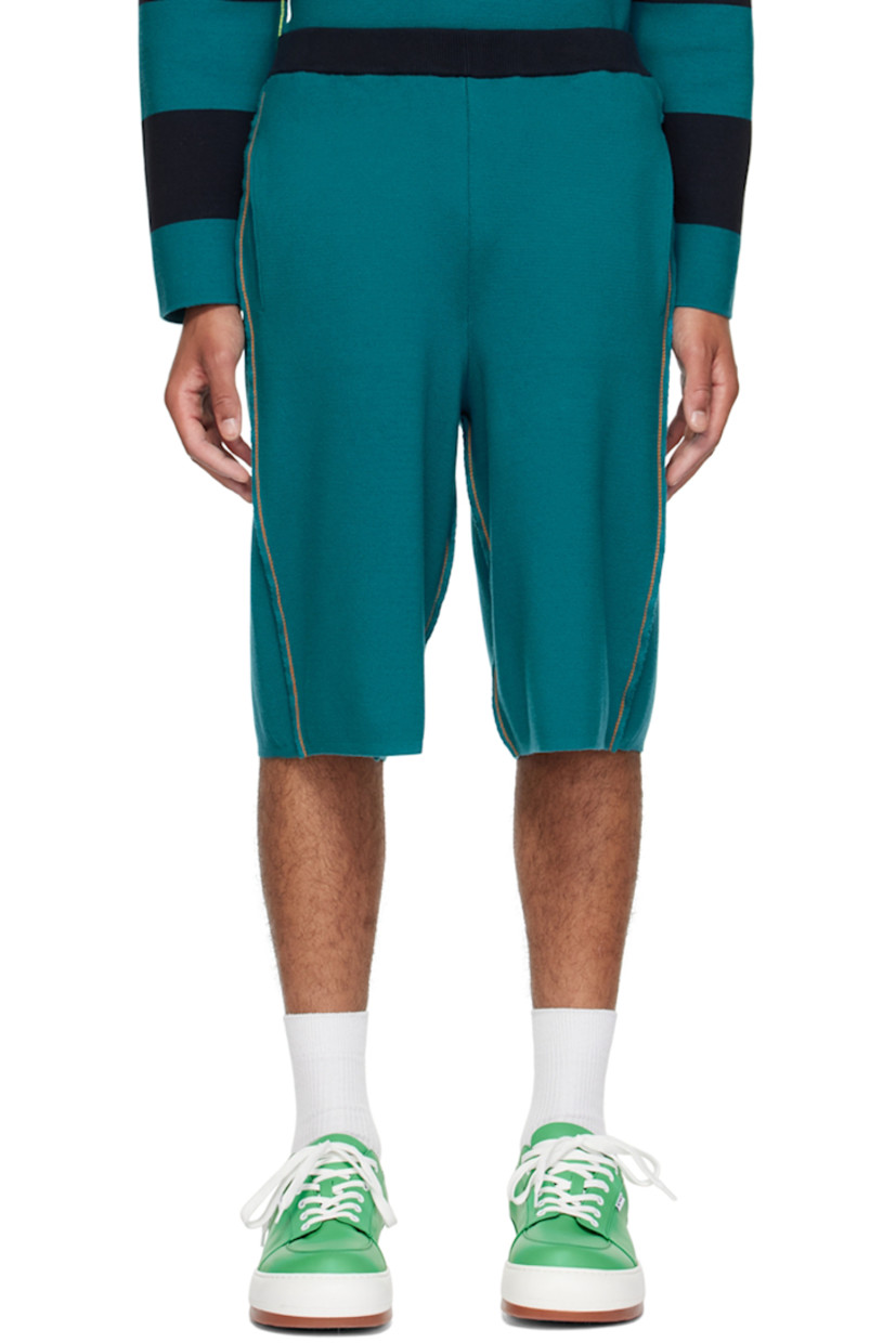 Knit cotton shorts. 

· Elasticized waistband
· Logo flag at outseam
· Four-pocket styling
· Rib knit cuffs
· Pinched seams throughout
· Contrast stitching in orange

Supplier color: Blunero/Ottanio