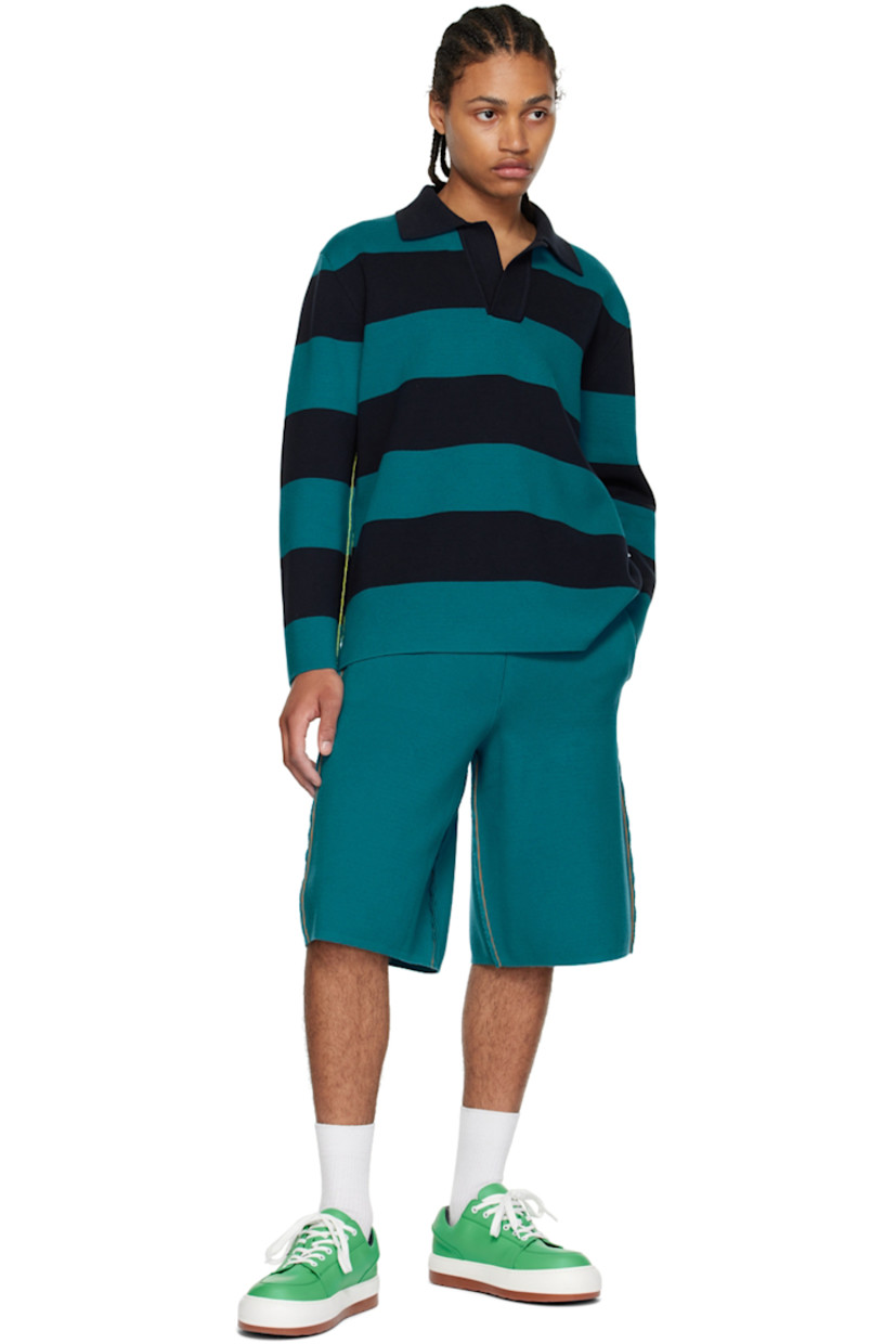 Knit cotton shorts. 

· Elasticized waistband
· Logo flag at outseam
· Four-pocket styling
· Rib knit cuffs
· Pinched seams throughout
· Contrast stitching in orange

Supplier color: Blunero/Ottanio