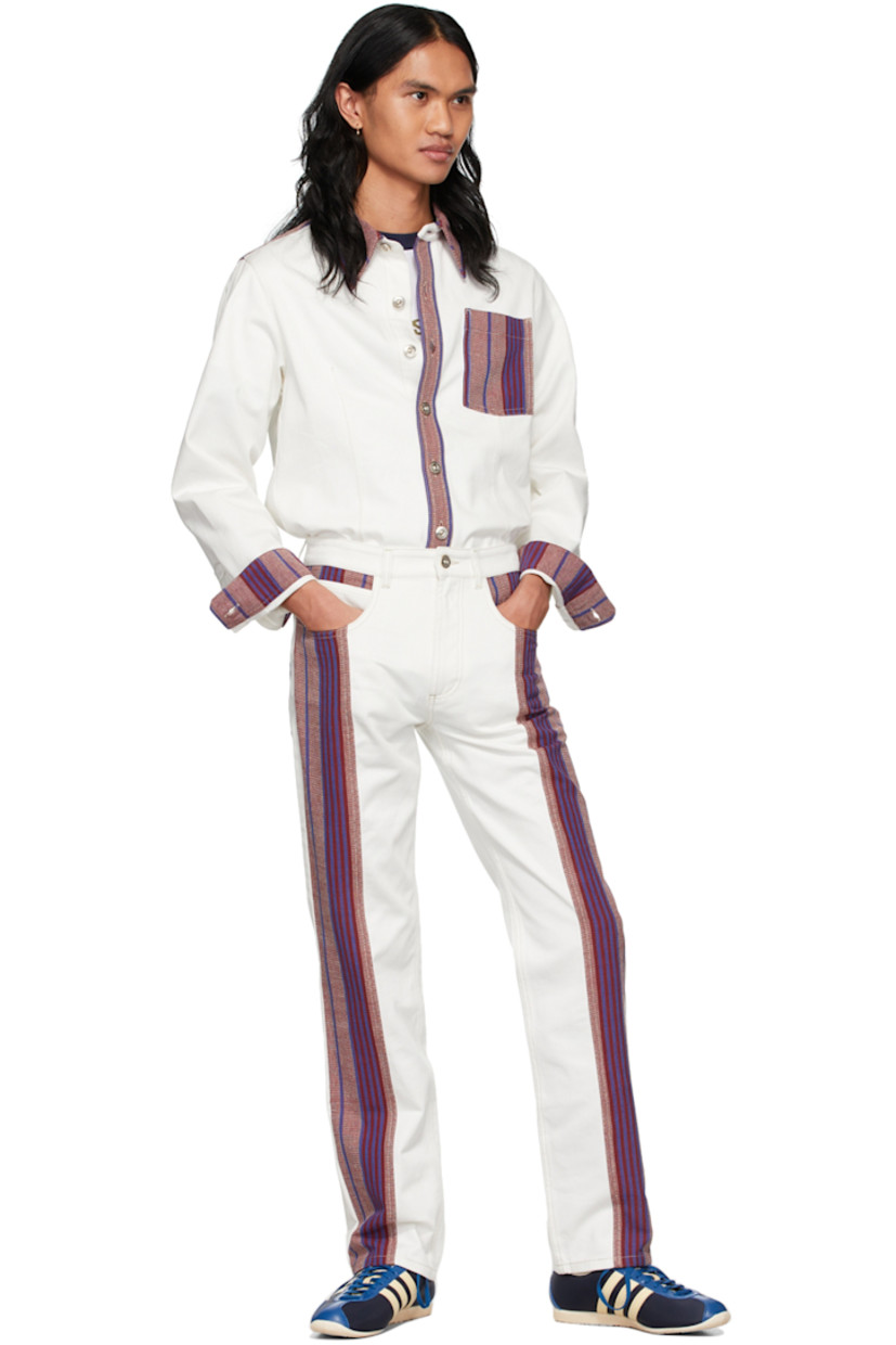 Non-stretch denim jeans. 

· Belt loops  
· Zip-fly 
· Five-pocket styling 
· Hand-woven organic cotton panels throughout
· Logo-engraved hardware

Supplier color: White