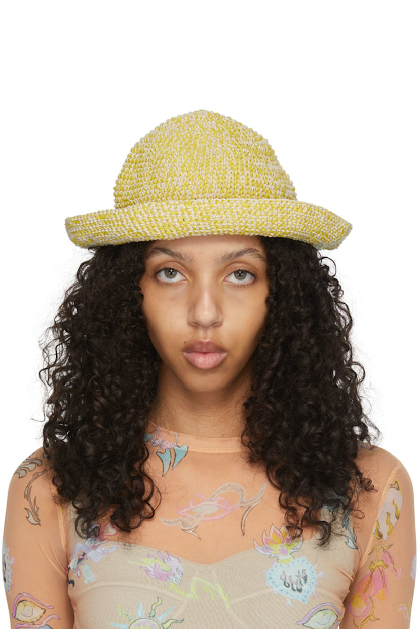 Crochet knit cotton-blend bucket hat in yellow and white. Scalloped brim.

Available exclusively at SSENSE.

Supplier color: Rope yellow