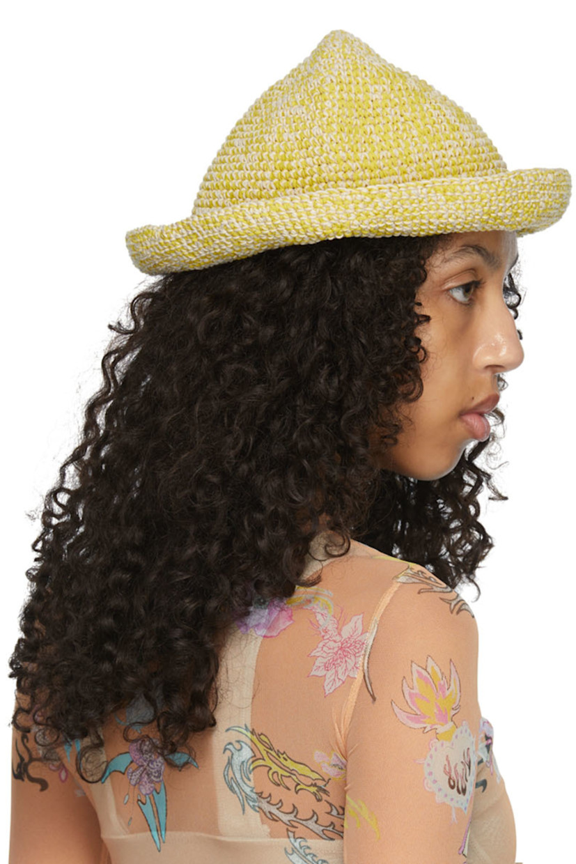 Crochet knit cotton-blend bucket hat in yellow and white. Scalloped brim.

Available exclusively at SSENSE.

Supplier color: Rope yellow
