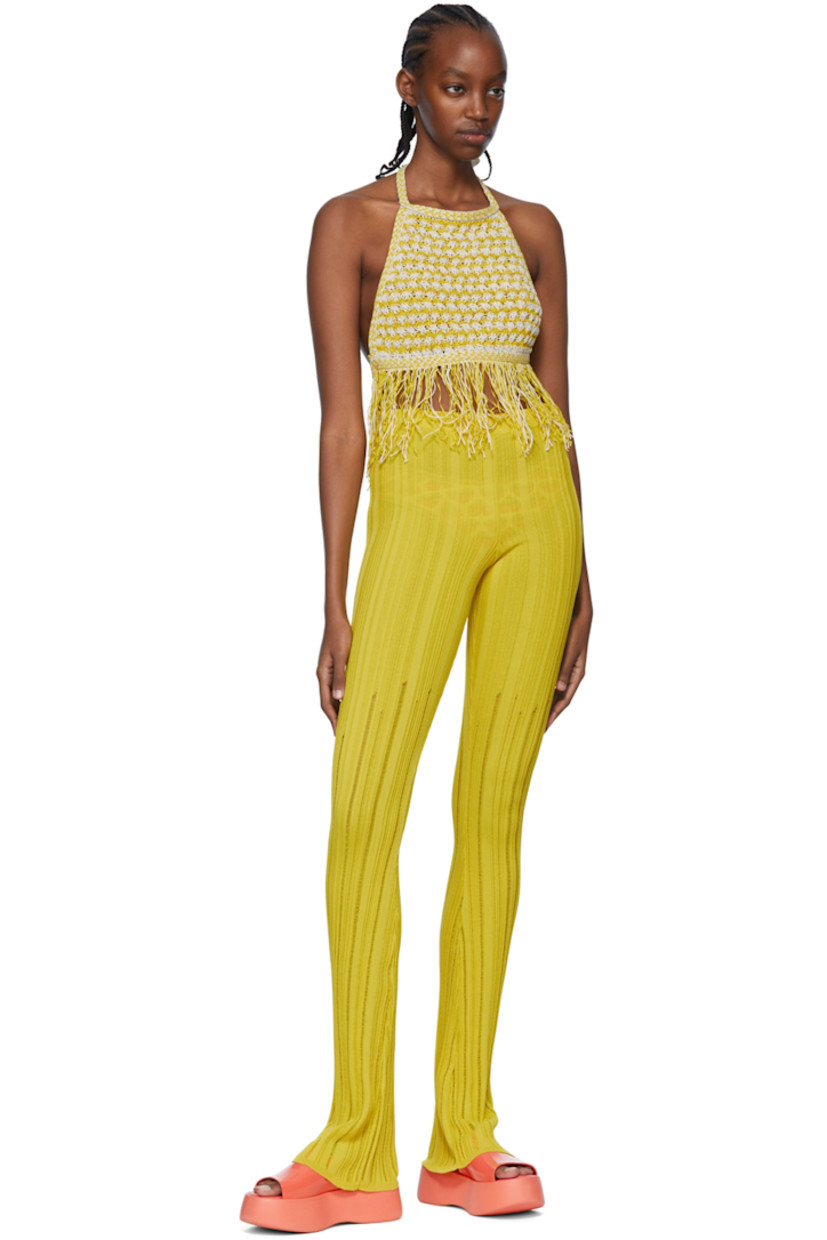 Knit cotton and linen-blend tank top.

· Self-tie halter straps
· Self-tie straps at back
· Fringe detailing at hem

Available exclusively at SSENSE.

Supplier color: Rope yellow