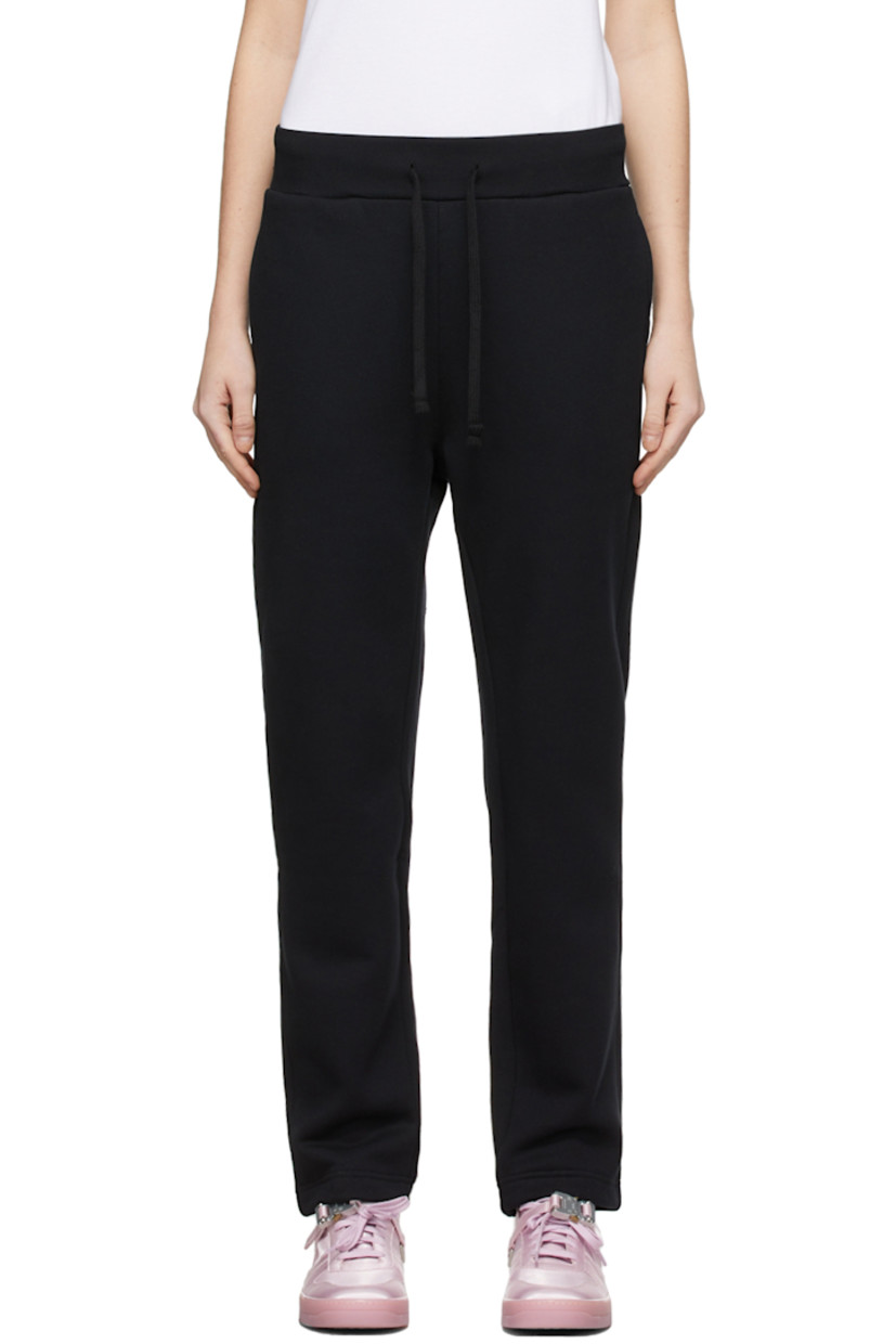 Relaxed-fit French terry lounge pants in black. 

· Mid-rise
· Drawstring at elasticized waistband
· Three-pocket styling
· Drawstring at cuffs
· Signature silver-tone lightercap detail at back

Supplier color: Black