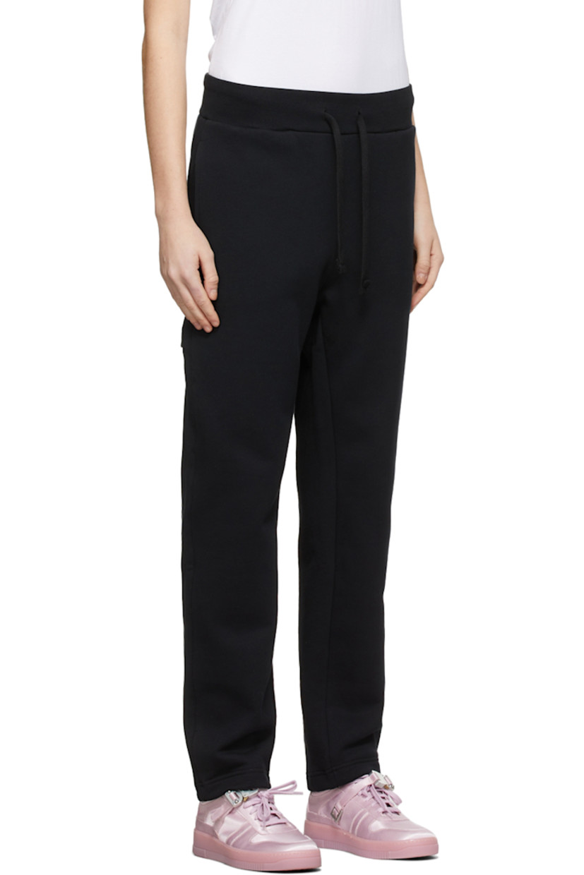 Relaxed-fit French terry lounge pants in black. 

· Mid-rise
· Drawstring at elasticized waistband
· Three-pocket styling
· Drawstring at cuffs
· Signature silver-tone lightercap detail at back

Supplier color: Black