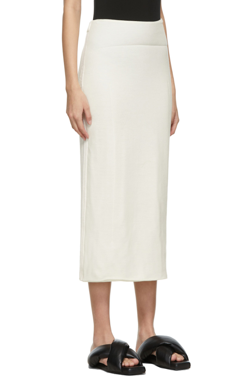 Paneled insulated wool jersey and rib knit wool mid-length skirt in off-white.

· Mid-rise
· Elasticized waistband
· Vent at front hem

Supplier color: Off-white/White
