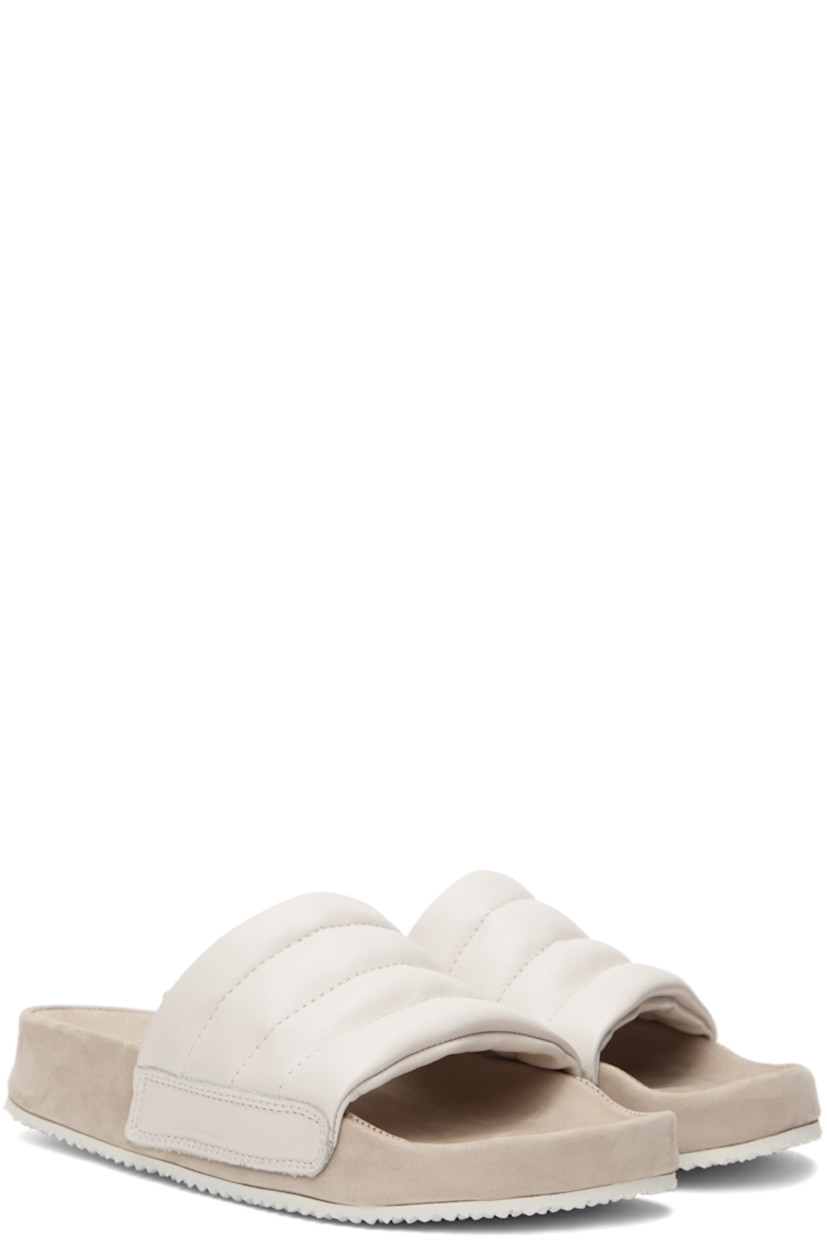 Quilted nappa leather slip-on sandals in off-white. 

· Logo embossed at suede footbed
· Treaded rubber sole

Supplier color: Off-white