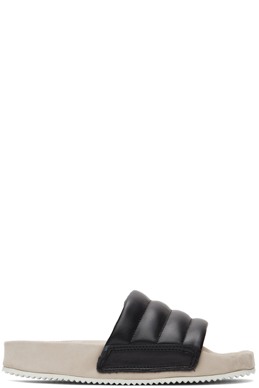 Quilted nappa leather slip-on sandals in black. 

· Logo embossed at suede footbed
· Treaded rubber sole

Supplier color: Black