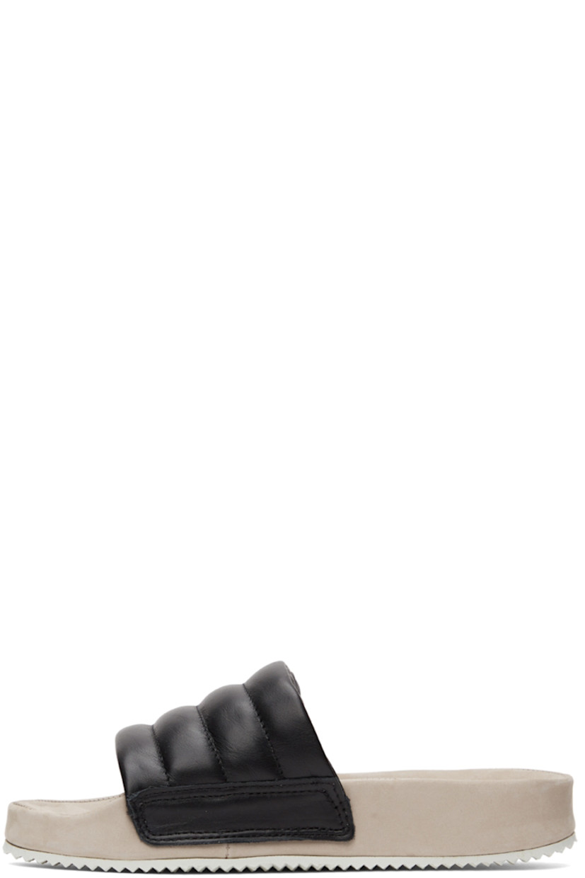 Quilted nappa leather slip-on sandals in black. 

· Logo embossed at suede footbed
· Treaded rubber sole

Supplier color: Black