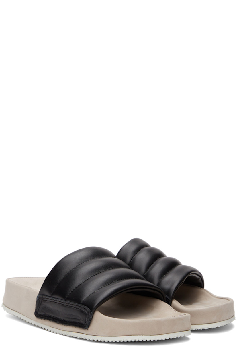 Quilted nappa leather slip-on sandals in black. 

· Logo embossed at suede footbed
· Treaded rubber sole

Supplier color: Black