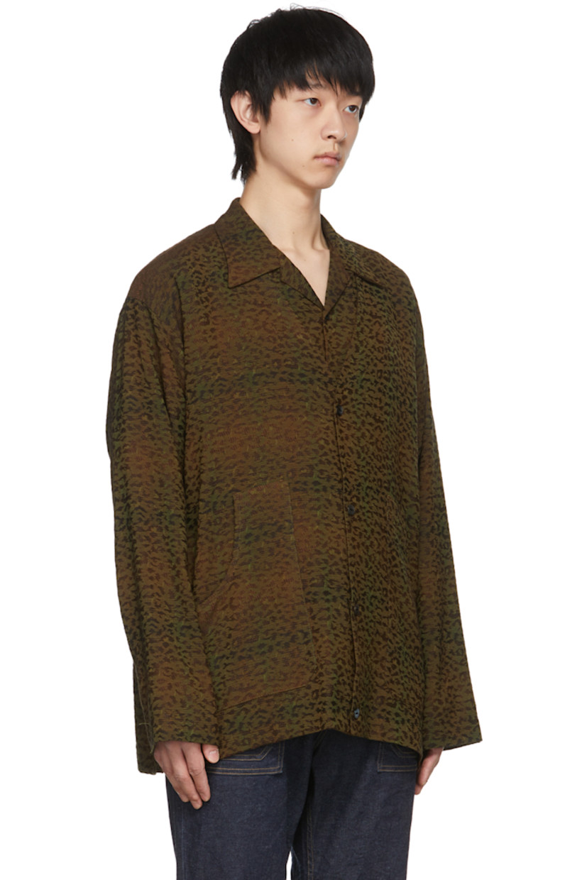 Long sleeve jacquard-woven rayon and wool-blend cardigan featuring leopard pattern in khaki, brown, and orange.

· Y-neck collar
· Button closure at front
· Patch pockets at waist
· Mother-of-pearl hardware

Supplier color: Leopard
