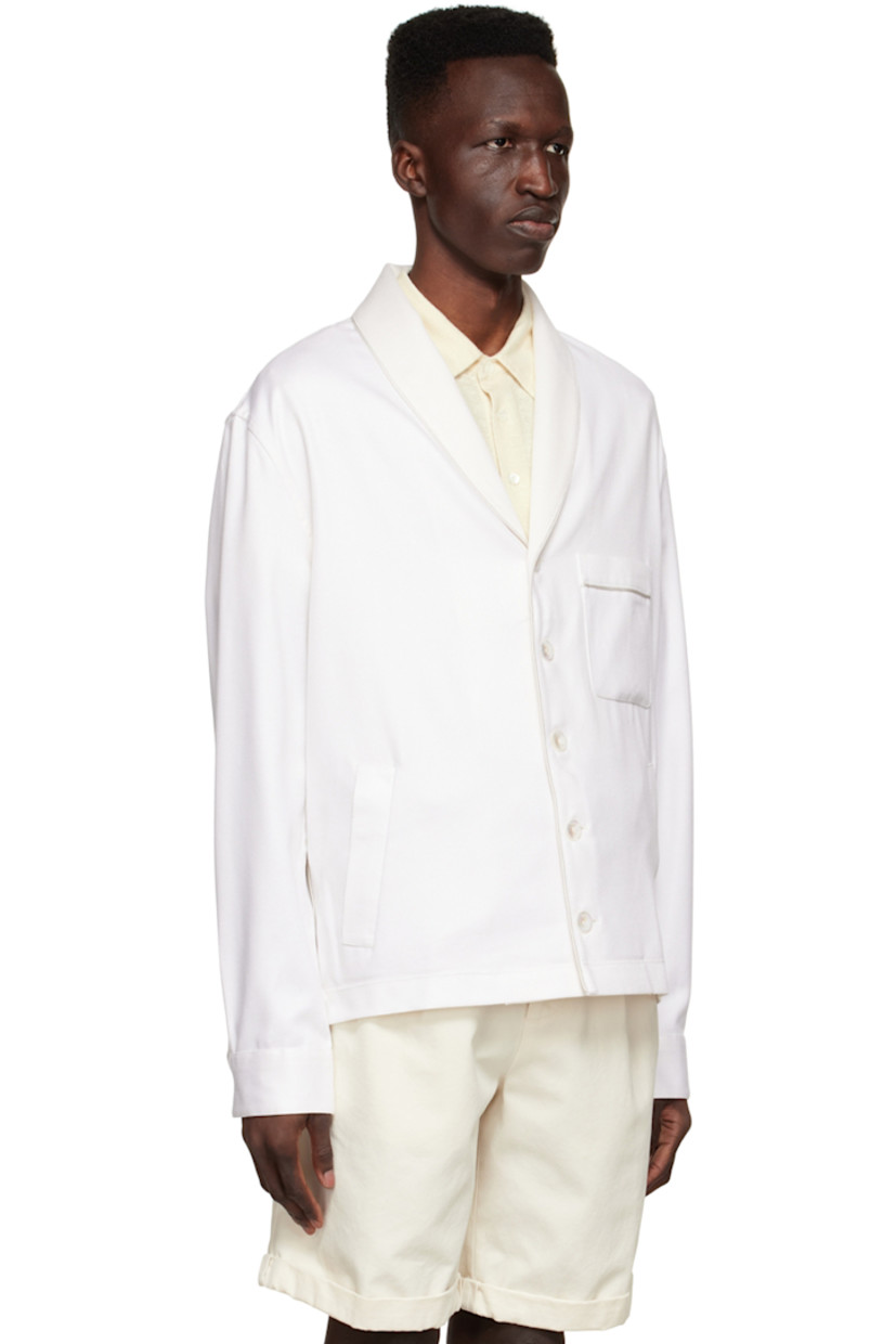 Cotton and silk-blend twill shirt. Trim throughout.

· Lapel collar
· Button closure
· Patch pocket at chest
· Welt pockets at waist
· Single-button barrel cuffs
· Vent at hem side-seams
· Partially lined

Supplier color: White