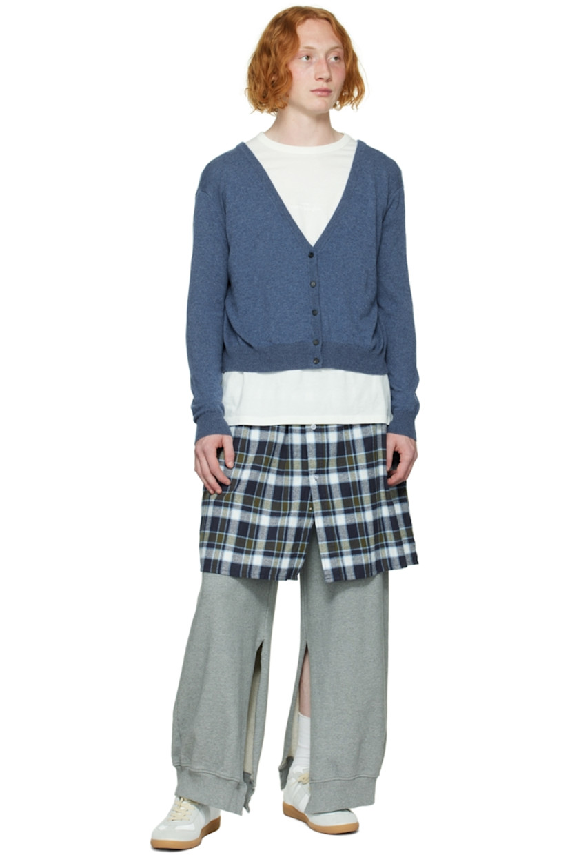 Knit cashmere cardigan. 

· Rib knit Y-neck, cuffs, and hem
· Button closure
· Extended back for alternate styling

Supplier color: Denim blue