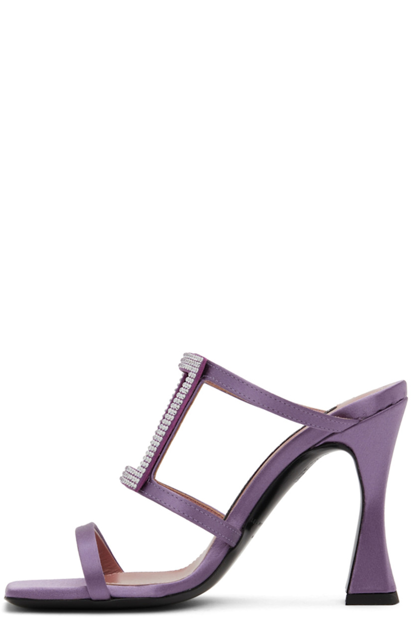 Satin slip-on heeled sandals in purple.

· Open square toe
· Crystal-cut accents at vamp
· Logo patch at grained leather footbed
· Covered stiletto heel with rubber injection
· Buffed leather sole
· Heel: H4 in

Supplier color: Amethyst