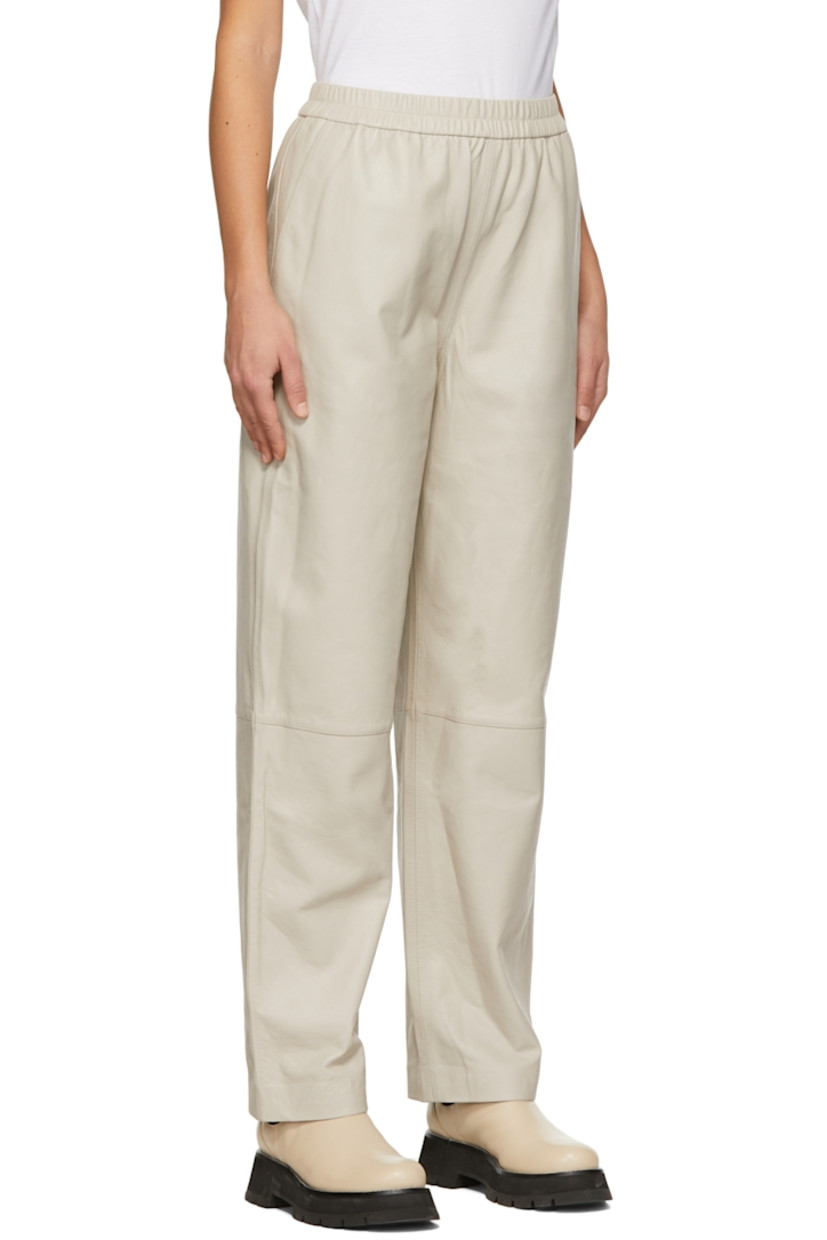Grained chrome-free lambskin pants.

· Elasticized waistband
· Two-pocket styling

Supplier color: Stone