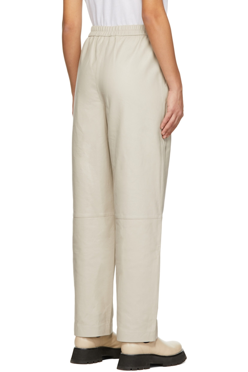 Grained chrome-free lambskin pants.

· Elasticized waistband
· Two-pocket styling

Supplier color: Stone