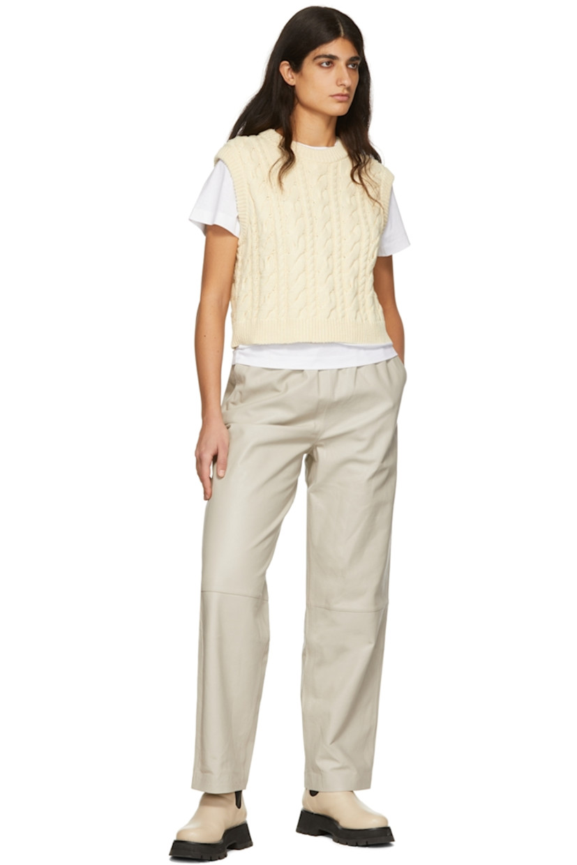Grained chrome-free lambskin pants.

· Elasticized waistband
· Two-pocket styling

Supplier color: Stone