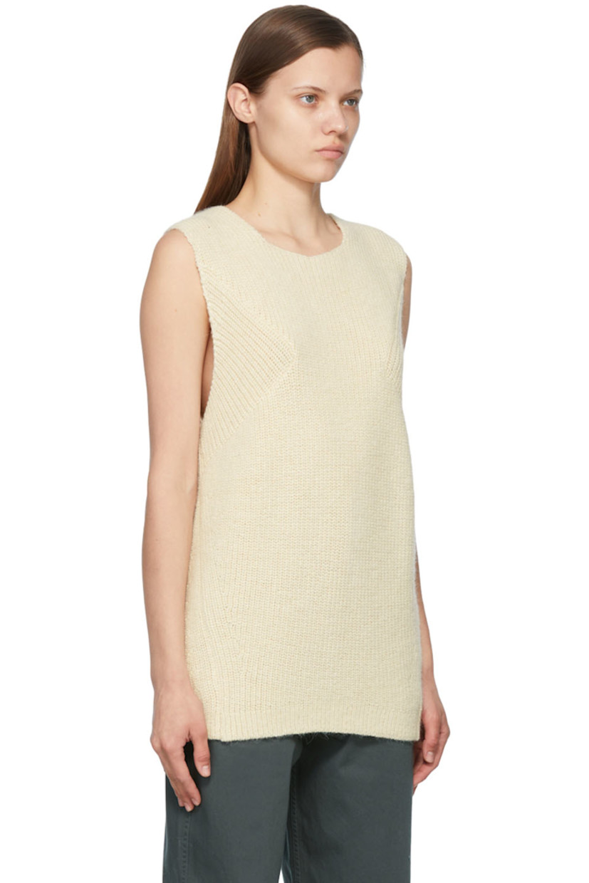 Knit alpaca and virgin wool-blend vest. Crewneck.

Supplier color: Wool white